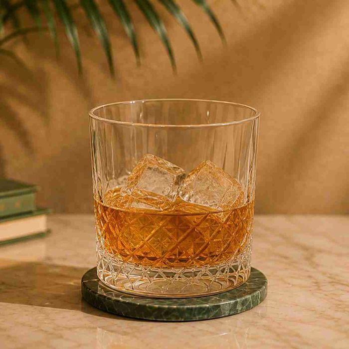 Rumbana neat over ice in a crystal tumbler